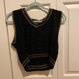 cropped, black and gray sweater top.